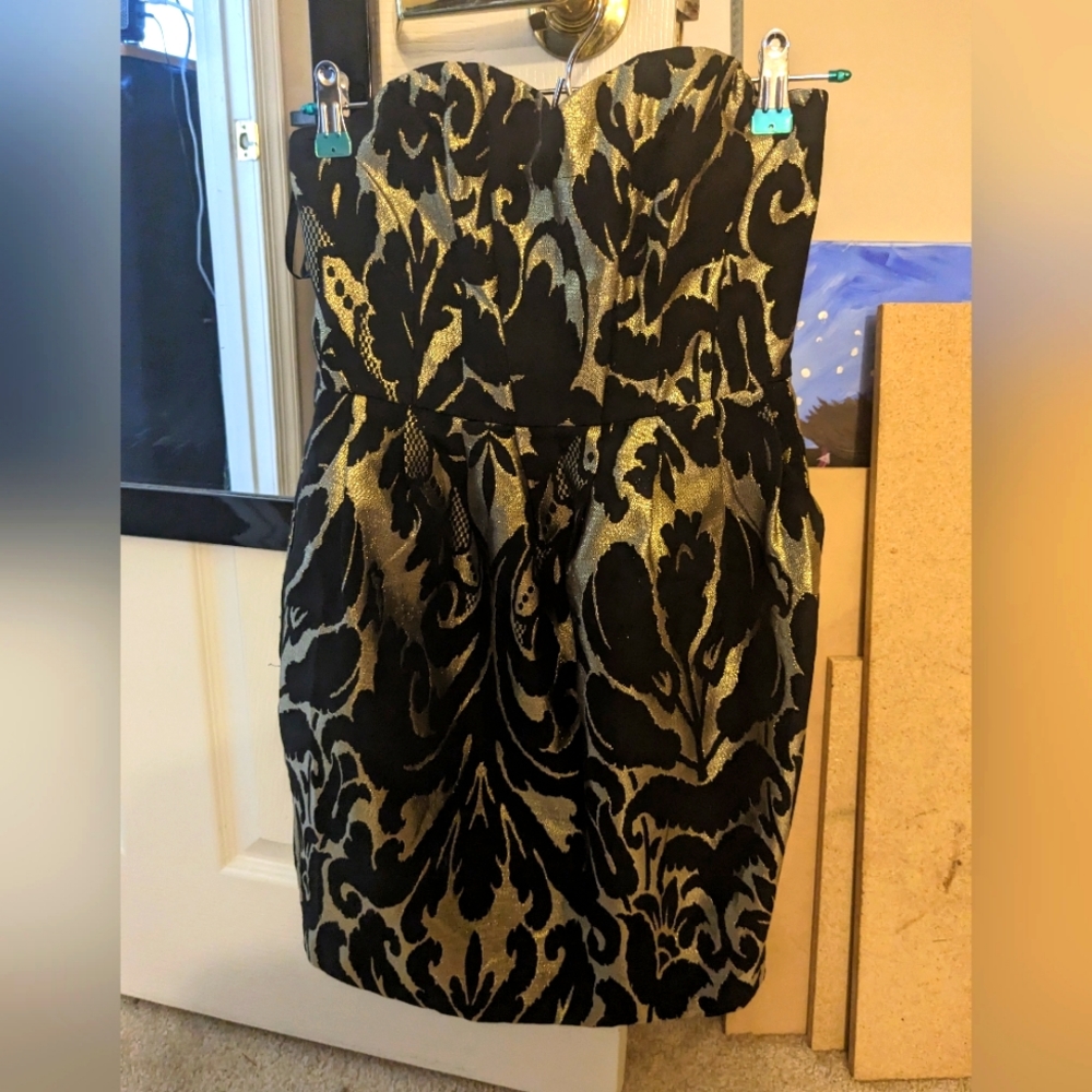 Mini black and gold strapless party dress